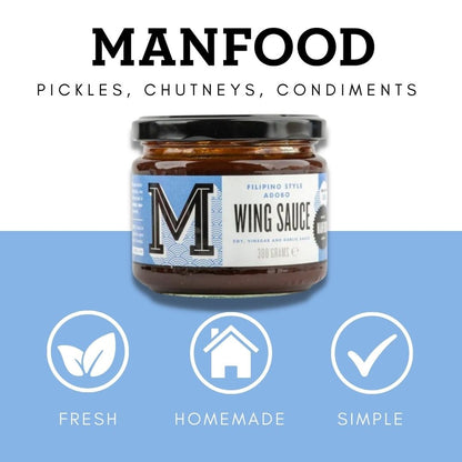Manfood Adobo Wing Sauce in a jar, showcasing rich, flavorful sauce with a deep reddish-brown color perfect for wings.