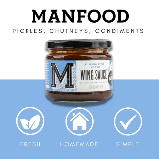 Manfood Adobo Wing Sauce in a jar, showcasing rich, flavorful sauce with a deep reddish-brown color perfect for wings.