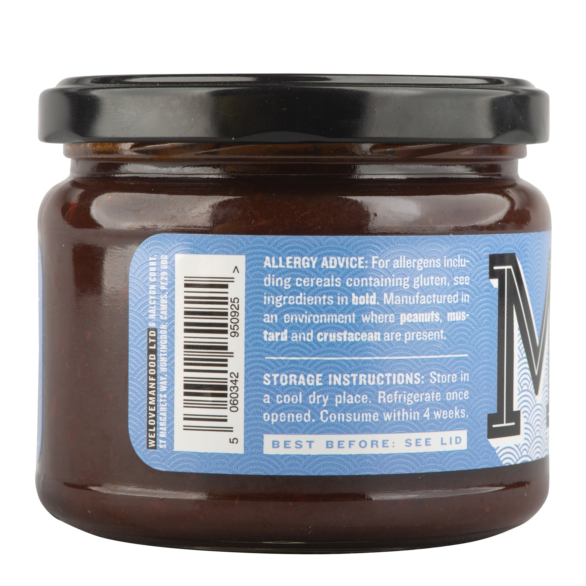 Manfood Adobo Wing Sauce in a jar, showcasing rich, flavorful sauce with a spicy and savory appearance for chicken wings.