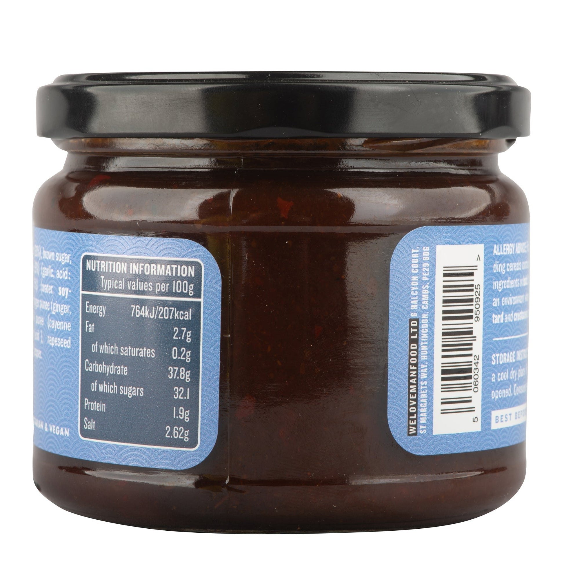Bottle of Manfood Adobo Wing Sauce with label showing spicy, savory wing sauce for chicken grilling or dipping.