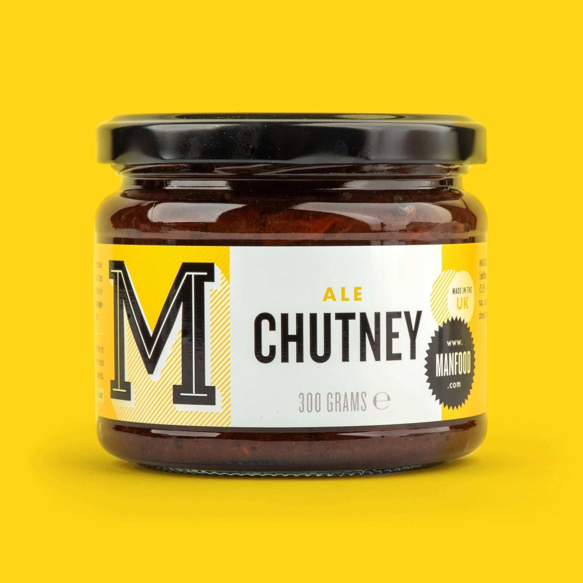 Manfood Ale Chutney in a jar, showing a rich, flavorful condiment with a dark, glossy appearance.