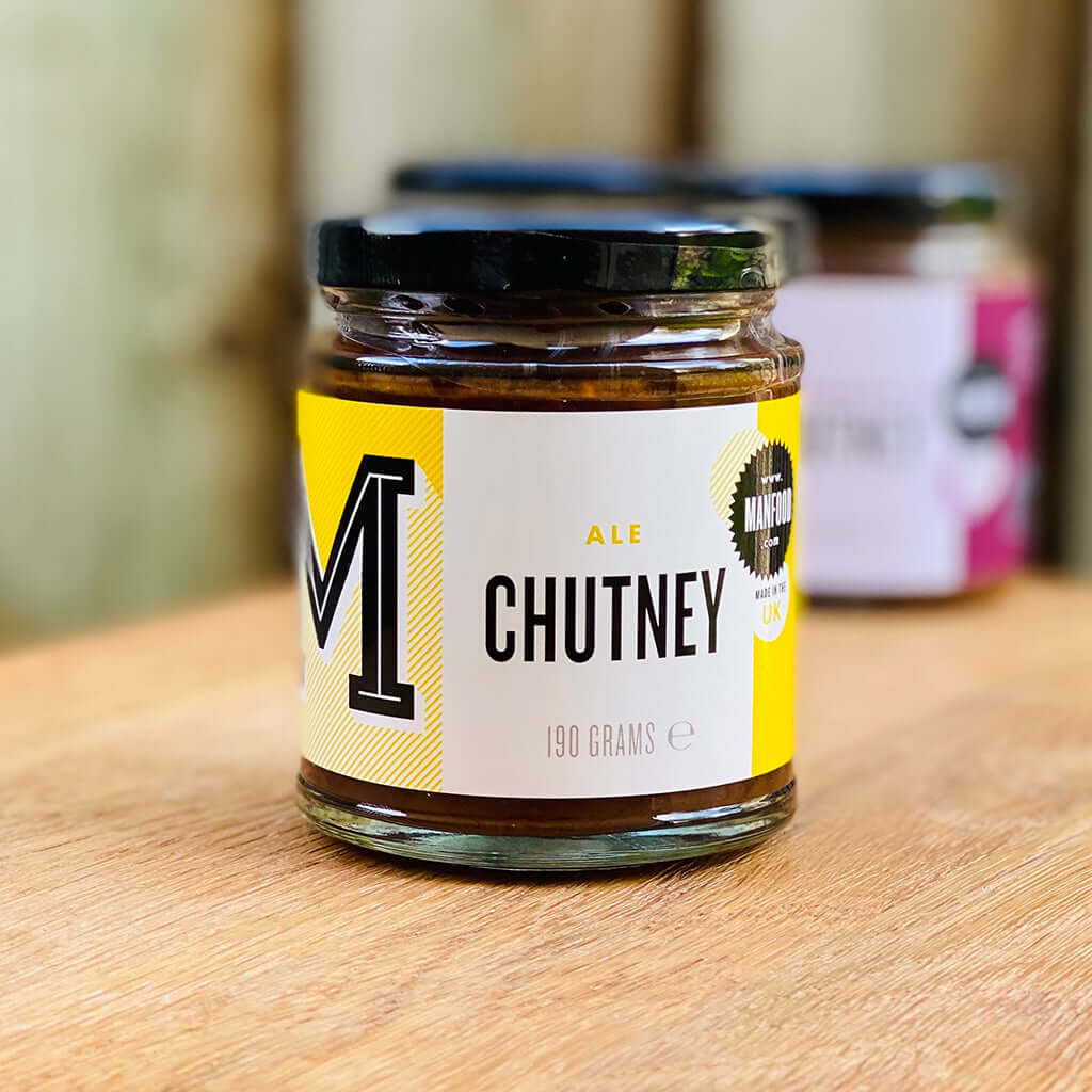 Manfood Ale Chutney jar showing rich, dark chutney with visible herbs and spices, ready to serve as a flavorful condiment.