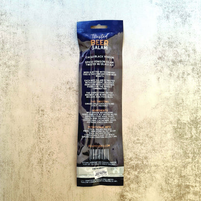 Bray Cured Beer Salami charcuterie pack featuring beer-infused salami and venison with cacao, displayed on a wooden board.