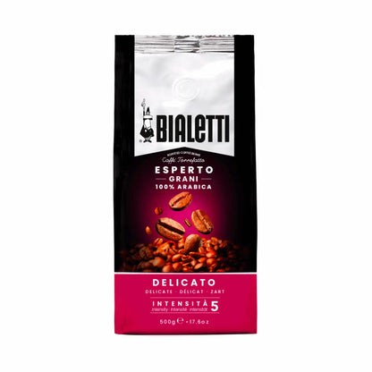 Bialetti Whole Bean Coffee by Brew Italia featuring a close-up of freshly roasted coffee beans labeled Delicato.