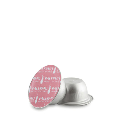 Bialetti Caffe’ d’Italia coffee capsules by Brew Italia, Gioia compatible, in a clear container showing the capsules.