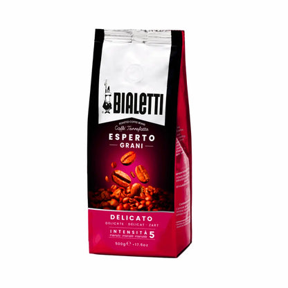 Bialetti Whole Bean Coffee by Brew Italia featuring a close-up of light brown coffee beans in a jar.