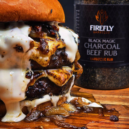 FireFly Barbecue Black Magic Charcoal Beef Rub on a jar label, highlighting a smoky BBQ rub for grilling and seasoning beef.