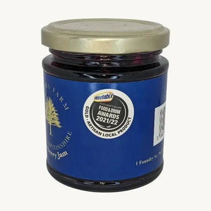 Friars Farm Blueberry Jam 200g jar showing fresh blueberries and rich, vibrant blueberry jam inside the glass container.