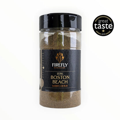 FireFly Barbecue Boston Beach Jerk Rub in a jar, showing the award badge on a black background, highlighting its flavor and quality.