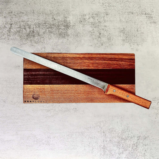 Bray Cured wooden charcuterie board with slicing knife for cheese and meats, natural wood finish, perfect for serving and prep.