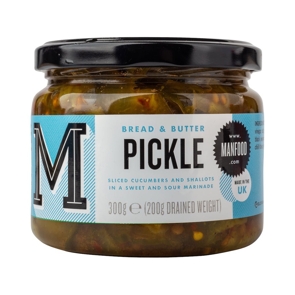 Jar of Manfood bread and butter pickles with slices visible, showcasing the golden, sweet, and tangy pickle chunks inside.