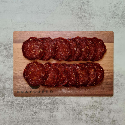 British Pepperoni charcuterie board featuring Bray Cured British beef pepperoni slices arranged with accompaniments.