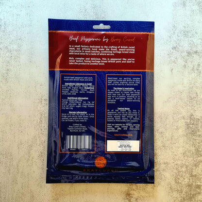 Back view of Bray Cured British Pepperoni charcuterie pack showing slices of cured beef pepperoni on a tray.