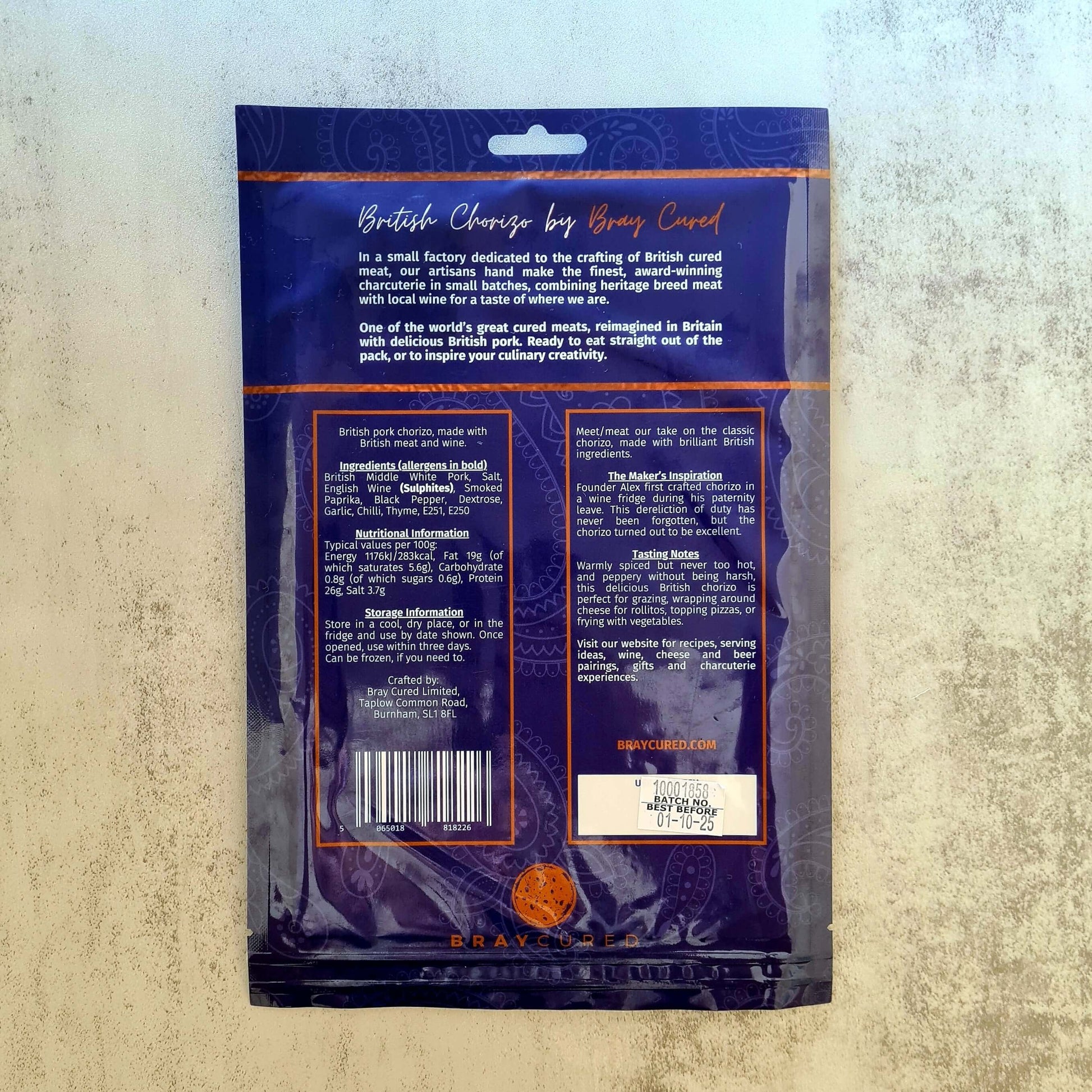 British Chorizo from Bray Cured, displayed in a charcuterie pack showing slices and whole sausage on a wooden board.