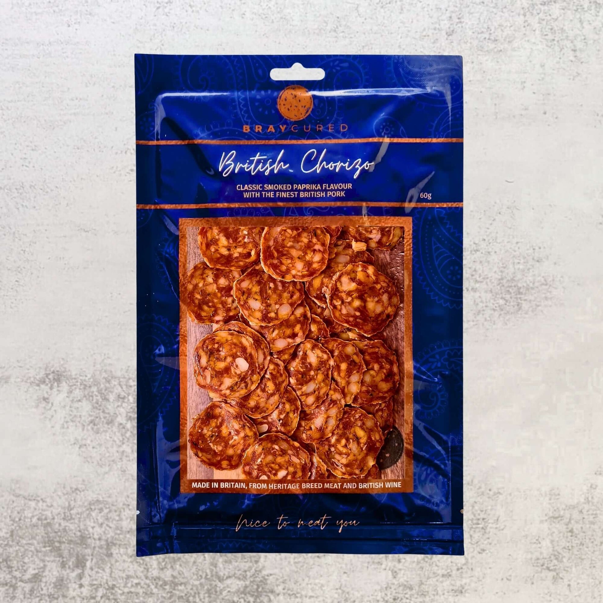British chorizo pack from Bray Cured's Spicy Feasting Five charcuterie selection, showcasing slices of spicy cured sausage.