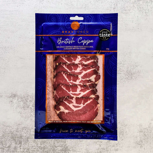 Thin slices of Bray Cured Air-Dried Coppa, a premium British charcuterie meat with marbled texture and rich flavor.