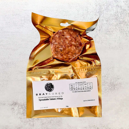British 'Nduja charcuterie from Bray Cured in a pack, showing the spicy, soft spreadable sausage with visible red pepper flakes.