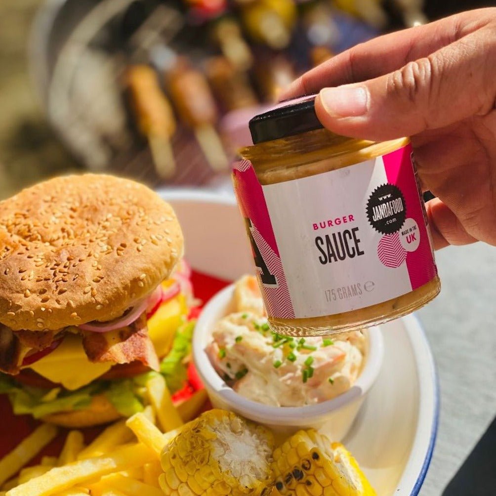 Janda burger sauce bottle with creamy, tangy sauce for burgers, featuring a sleek label and a squeeze bottle design.