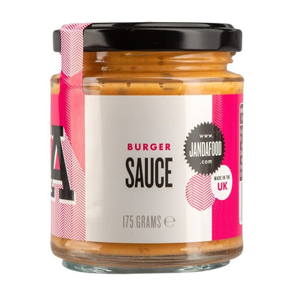 Janda burger sauce in a jar, creamy condiment with a smooth texture, ideal for enhancing burger flavor.