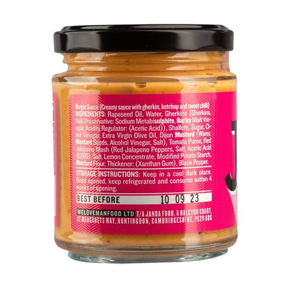 Janda Burger Sauce in a bottle, creamy and flavorful condiment for burgers, with a smooth texture and golden color.