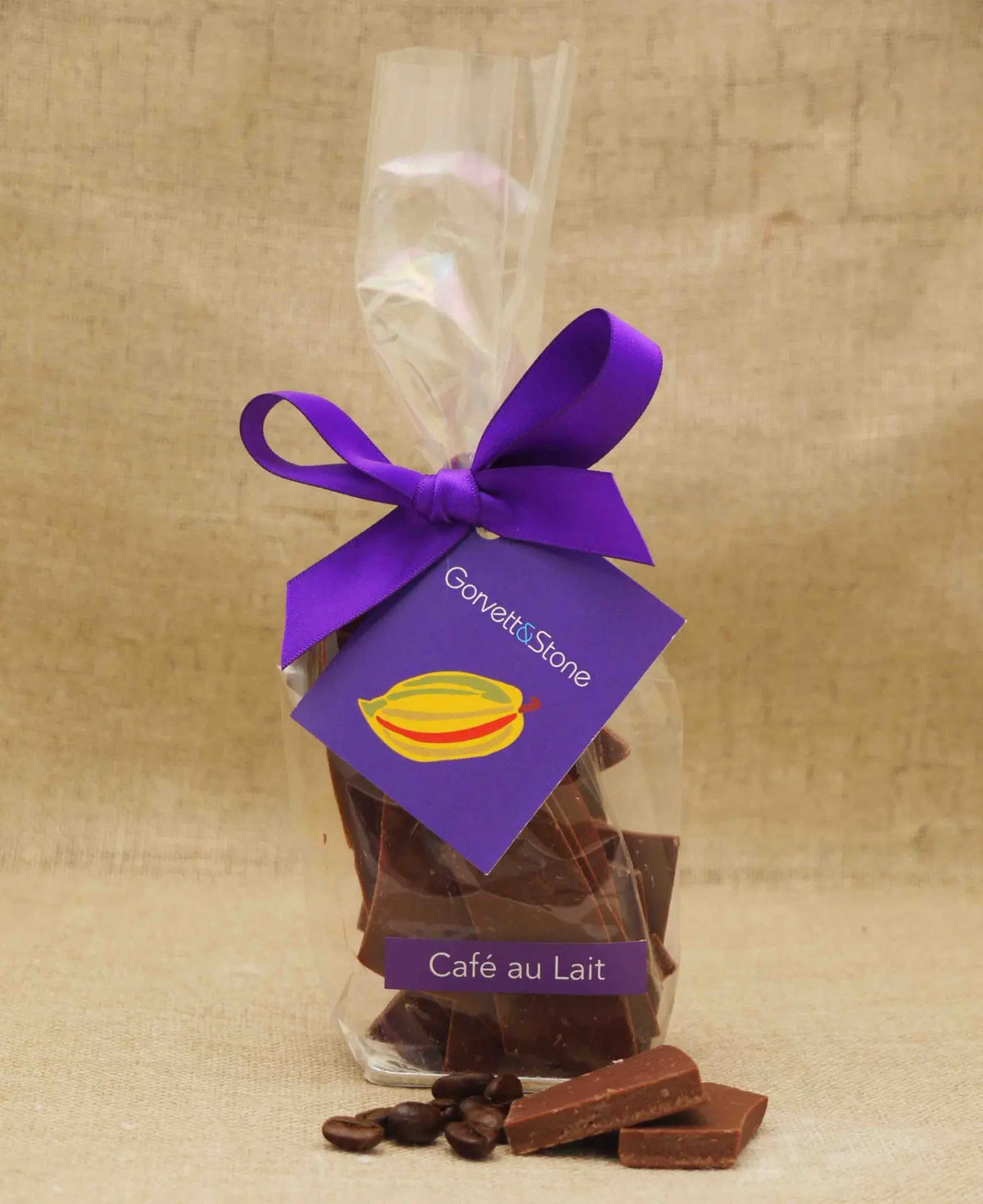 Handmade Gorvett & Stone Cafe au Lait Fine Milk Chocolate Shards in a bag, showcasing creamy milk chocolate pieces with a smooth texture.