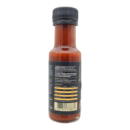 FireFly Barbecue Carolina Reaper Hot Chilli Sauce bottle with vibrant label and fiery red chili peppers in the background.