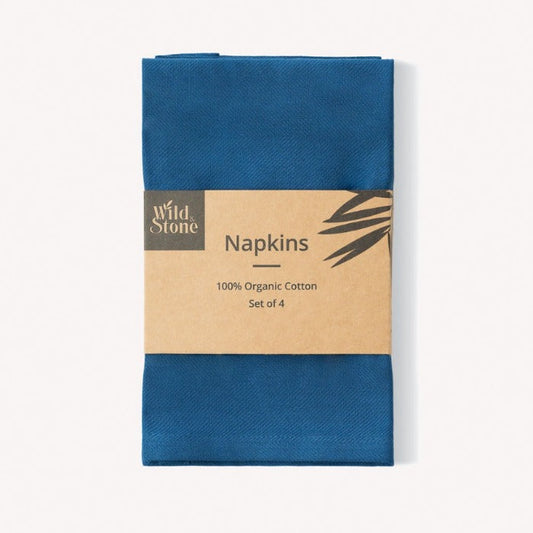Set of four organic cotton napkins by Wild And Stone, featuring natural fabric with a soft, textured appearance.