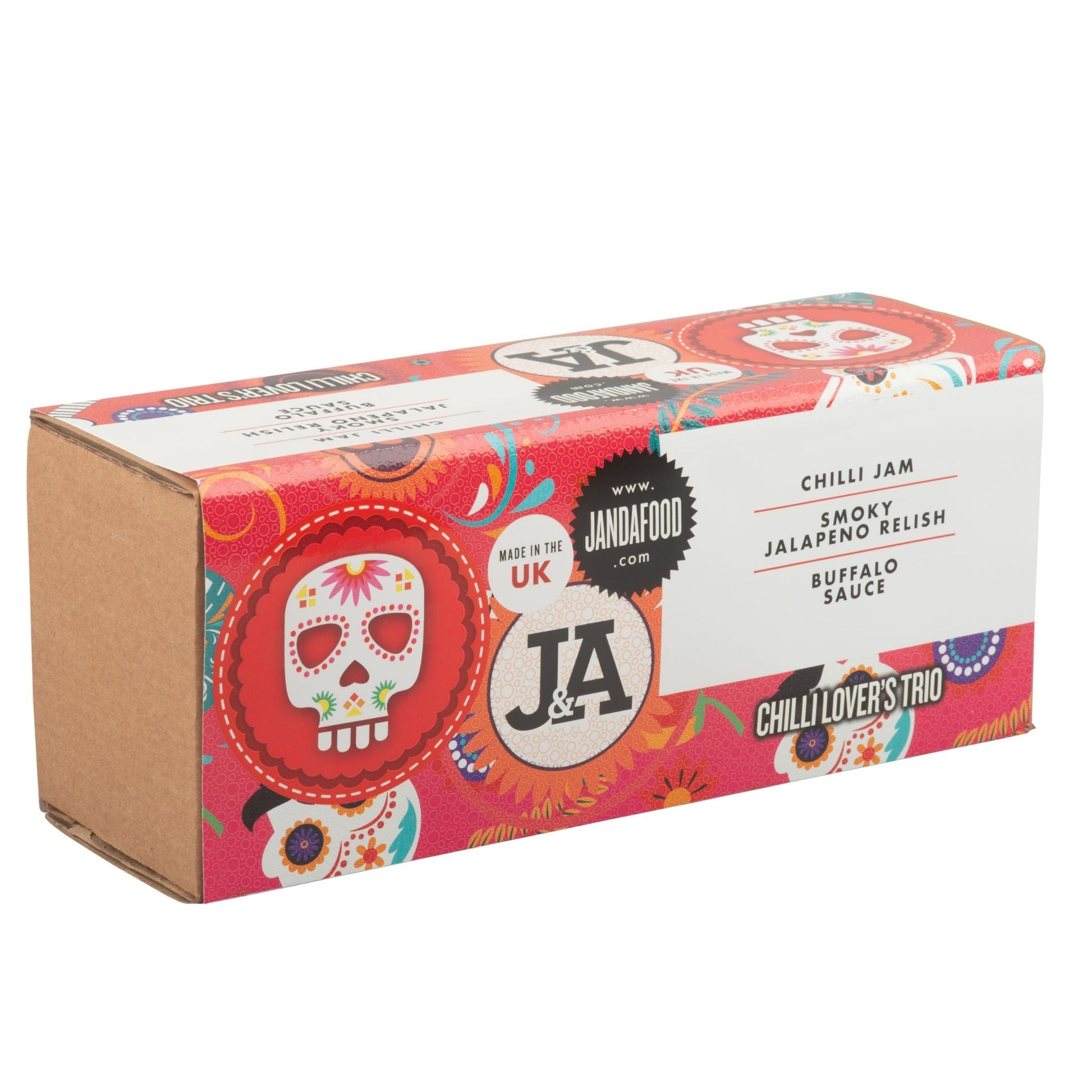 Janda Chilli Lover's Trio gift box with three varieties of spicy chili products, vibrant packaging and fresh chili peppers inside.