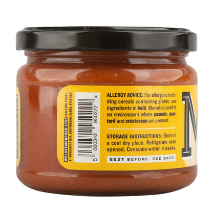 Manfood chilli sauce bottle with vibrant red sauce and label, showcasing the spicy condiment for enhancing dishes.