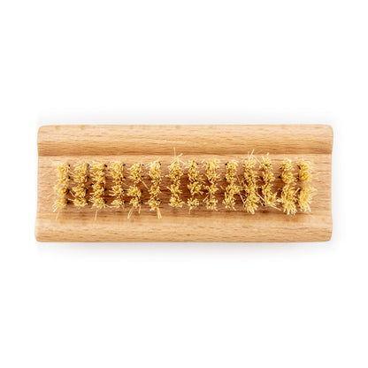 Wild and Stone biodegradable natural bristle nail brush with wooden handle for gentle nail cleaning and maintenance.