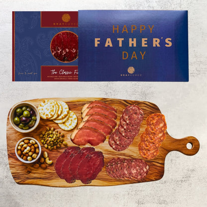 Bray Cured Classic Feasting Five charcuterie selection on a wooden board with cheeses, meats, and accompaniments for a festive gathering.