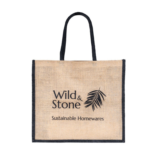 Natural jute hessian shopping bag by Wild And Stone with sturdy handles and spacious interior for eco-friendly shopping.