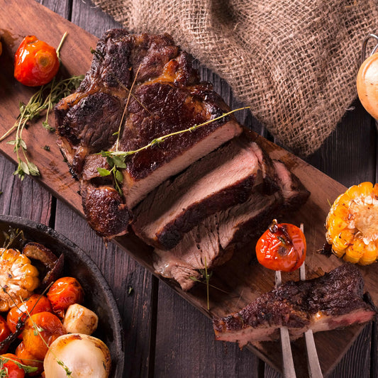 Cooked Primrose Herd beef brisket joint, flat cut with a tender, juicy appearance, perfect for slicing and serving.