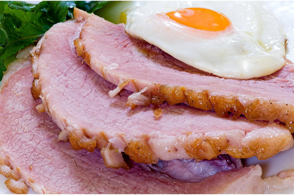 Primrose Herd smoked boneless gammon joint, rolled and cooked, ready for slicing, from Cornish outdoor-reared pigs.