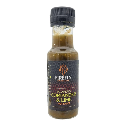 FireFly Barbecue Jalapeno Coriander & Lime hot sauce bottle, vibrant green and orange label with fresh ingredients.
