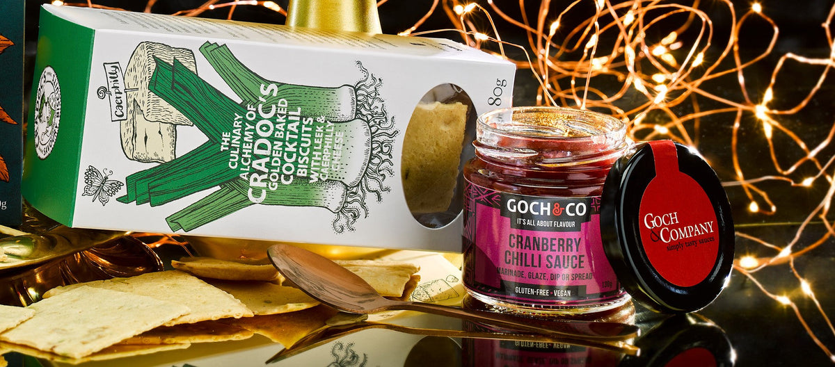 Goch & Co Celebration Hamper with assorted food items, including cranberry sauce, for festive Christmas occasions.