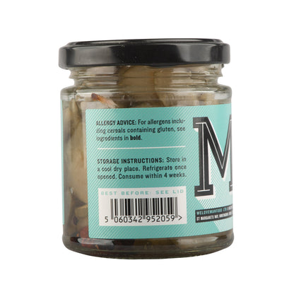 Manfood cucumber gin pickle showing fresh cucumber slices infused with gin flavors in a jar.