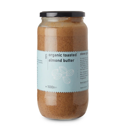 Organic toasted almond butter jar from Whole Food Earth with a natural nut butter spread and almond pieces visible inside.