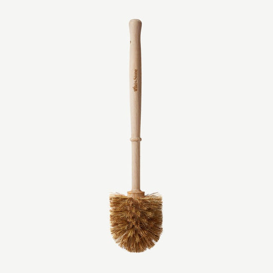 Wild And Stone plastic-free toilet brush with wooden handle and white bristles, eco-friendly bathroom cleaning tool