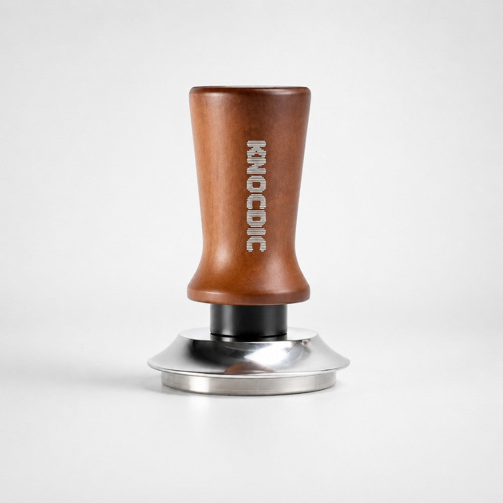 KNOCDIC® espresso tamper with spring-loaded base for even coffee tamping in barista espresso machines.