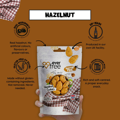 EverFree gluten-free hazelnut cookie on a plate, showing a golden-brown, crunchy texture with visible hazelnuts.