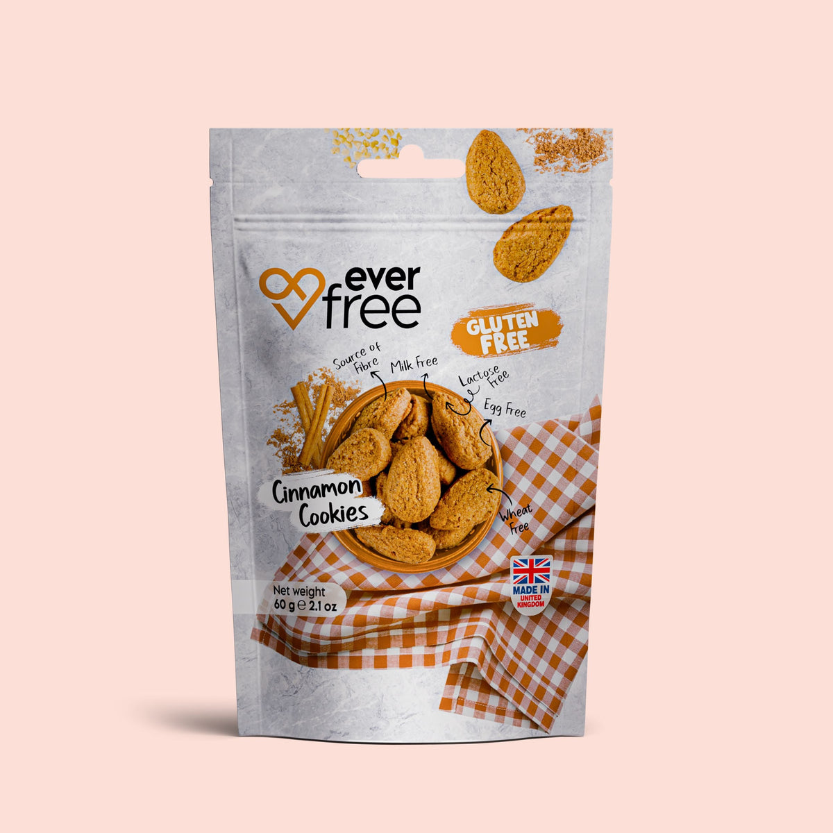 EverFree gluten-free cinnamon cookies in a pack of three, 60g each, with a golden-brown cookie appearance and hazelnut flavor hints.