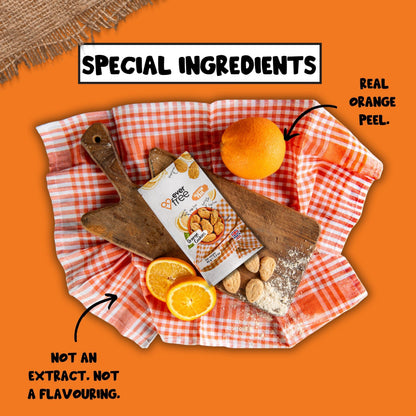 EverFree gluten-free orange cookies in a pack of 34, showing golden-brown cookies with orange zest pieces on top.