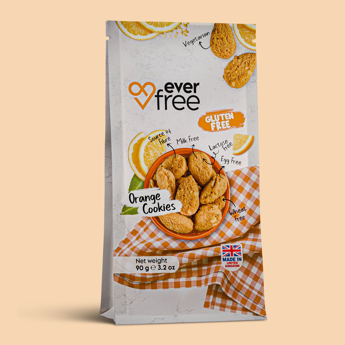 Three packs of EverFree gluten-free orange cookies with bright packaging, showcasing the vibrant cookie image on the front.