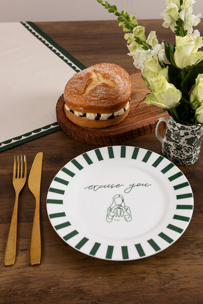 Bone china plate with "Excuse You" design by Avalon Home UK, shown on a table with a decorative setting.