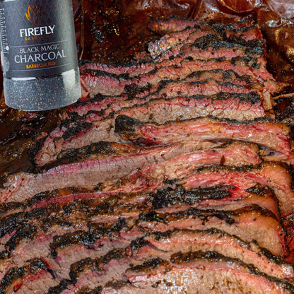 FireFly Barbecue Black Magic Charcoal Beef Rub in a jar, ideal for enhancing grilled beef with smoky flavor.