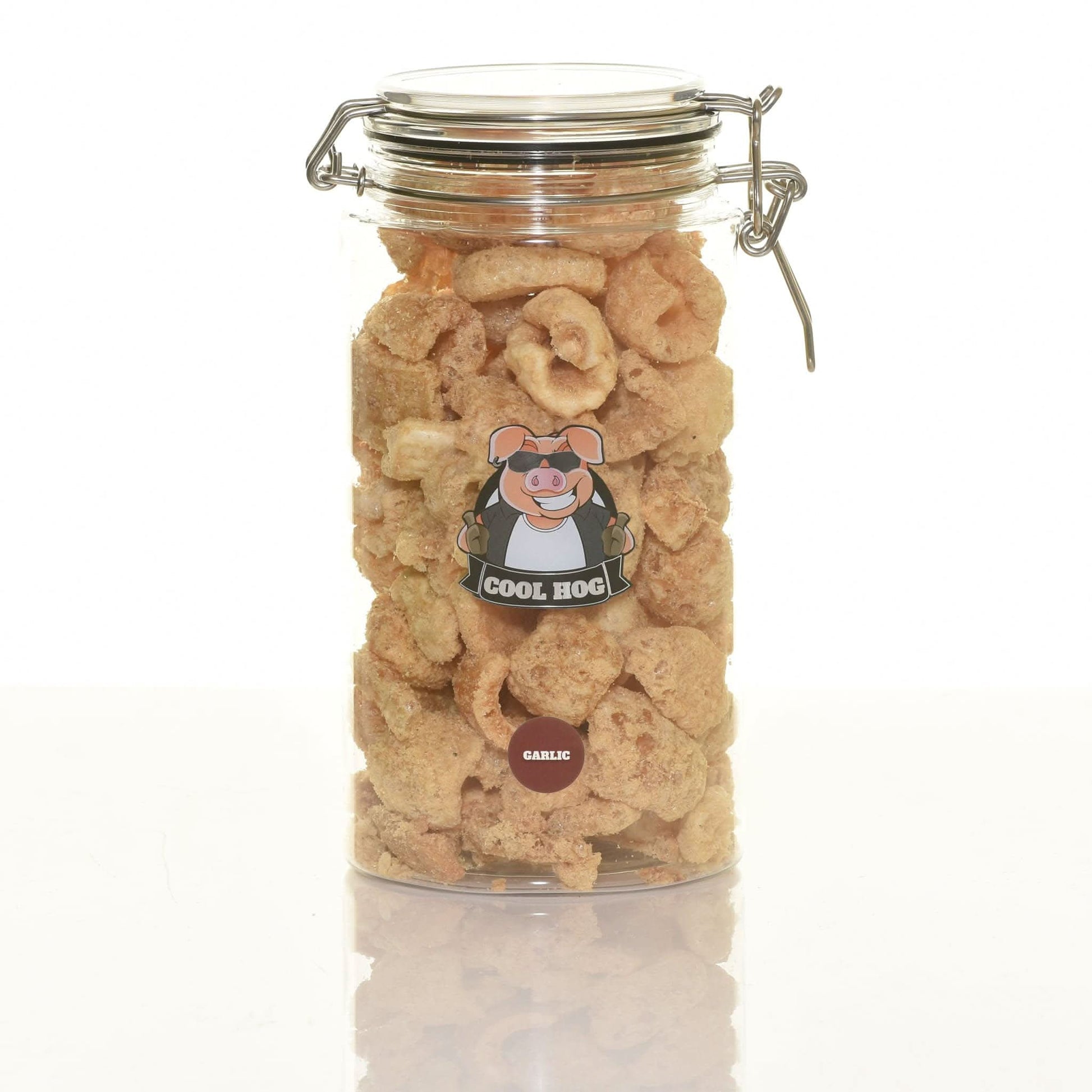 Garlic-flavored pork scratching jar by Cool Hog Snacks, showing a clear jar filled with crispy pork snacks with garlic seasoning.