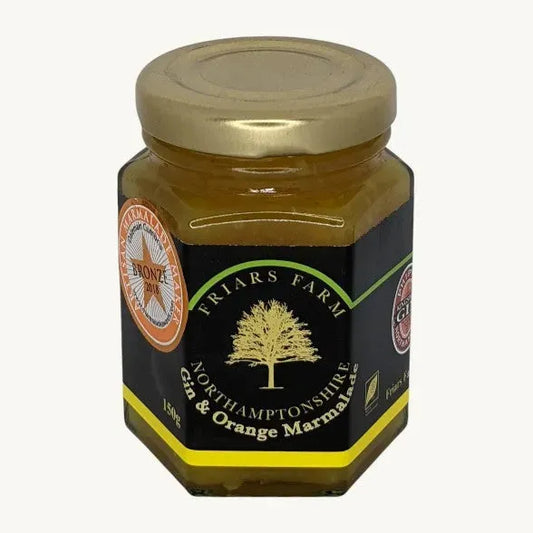 Jar of Friars Farm Gin and Orange Marmalade 200g with orange slices and marmalade spread visible inside the jar.