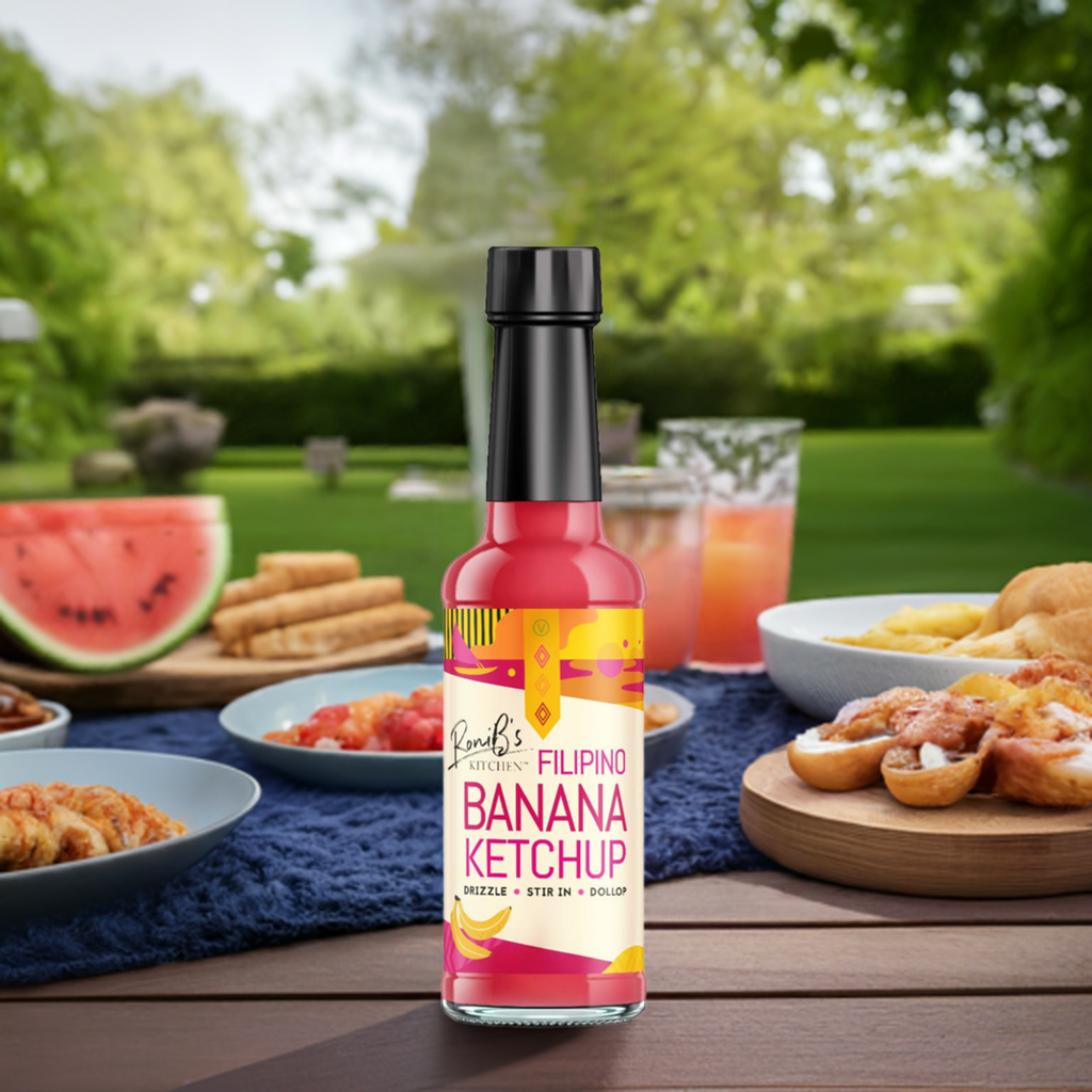 RoniBs Kitchen Filipino style banana ketchup bottle with label, showcasing the sweet and tangy condiment for Filipino cuisine.