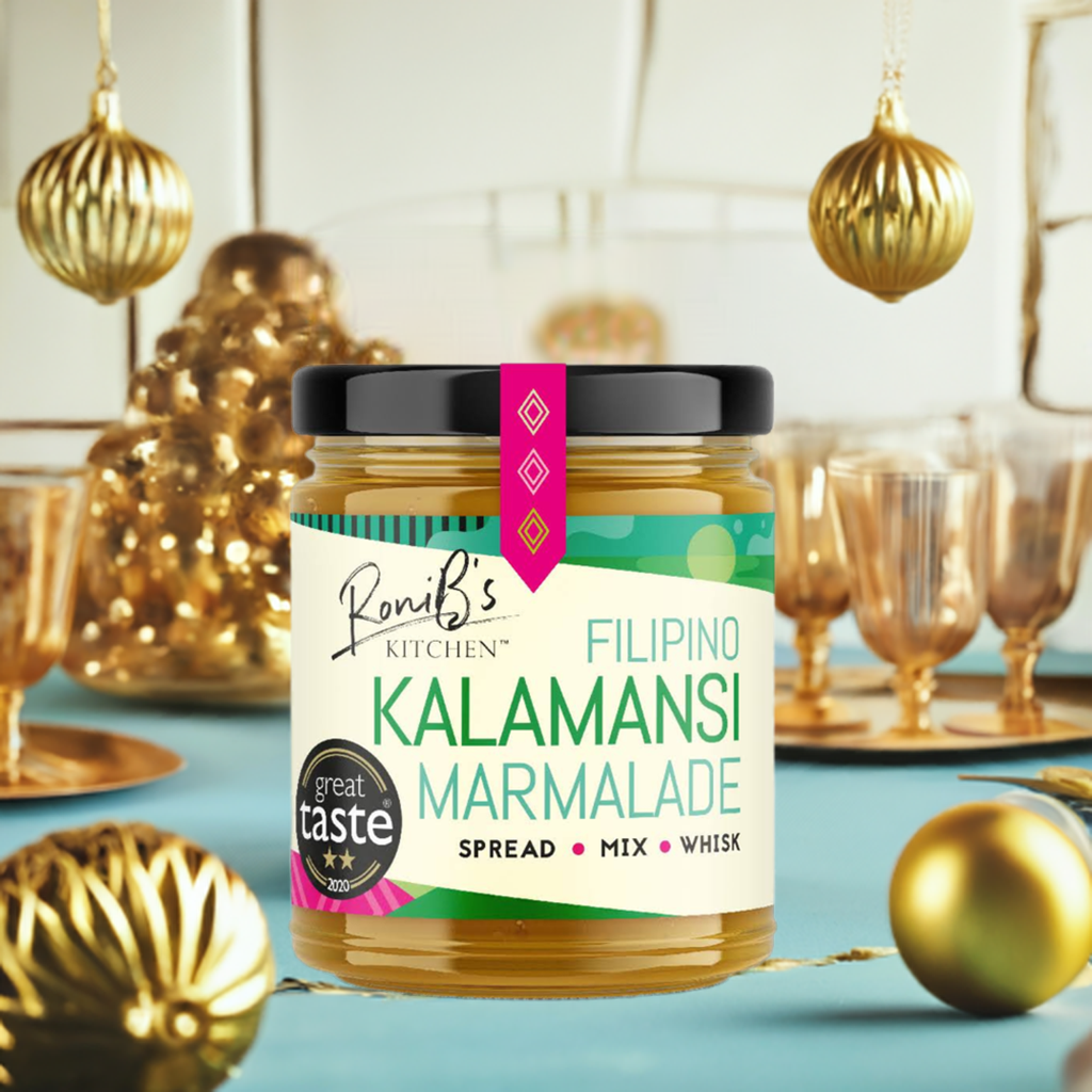 Filipino Kalamansi marmalade with Don Papa rum from RoniBs Kitchen, vegan jam, Great Taste Award winner, showcasing jar with marmalade and label.